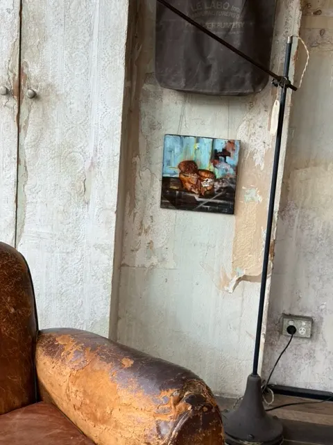 Small armchair painting installed at Le Labo Melbourne