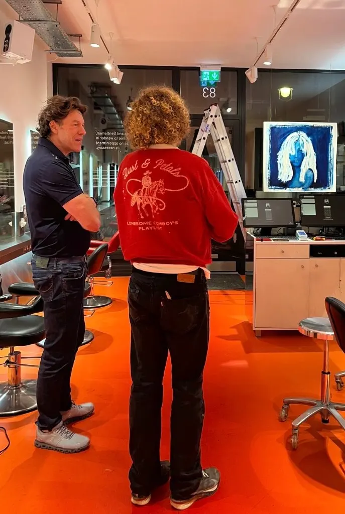 Inside Feel Soho with the blue portrait on display